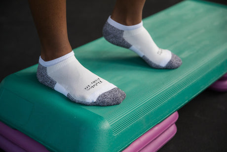 Feet wearing Thorlo socks