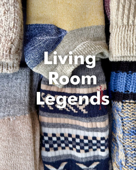 Stack of patterned socks with 'Living Room Legends' text overlay