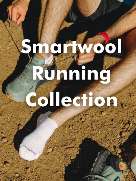 Person tying running shoes with 'Smartwool Running Collection' text overlay on a dirt ground.