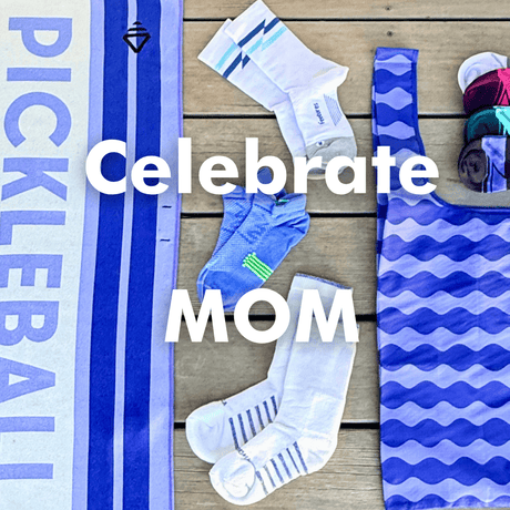 Pickleball equipment and socks on a wooden surface with text 'Celebrate Mom'.