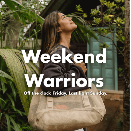A woman outdoors wearing a beige tote bag over her shoulder, surrounded by lush green foliage and a rustic building. Large white text overlays read 'Weekend Warriors' and 'Off the clock Friday.